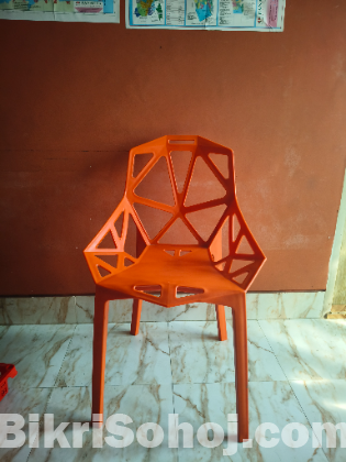 Stylish red ochre colour study chair